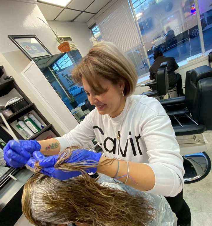 Colour being applied strand by strand at Astrid Beauty Salon